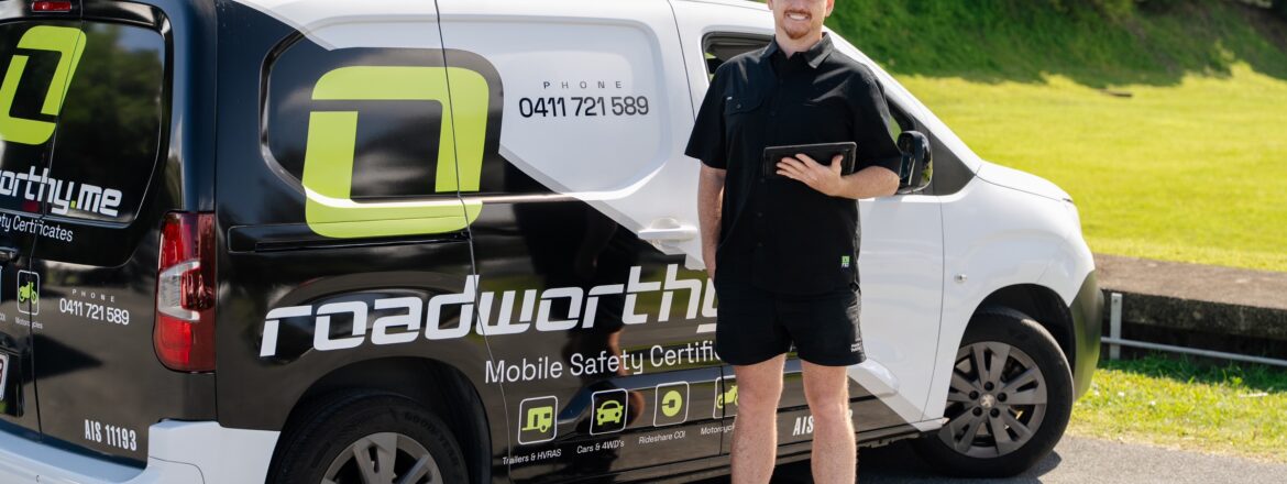 Roadworthy.me inspector with a tablet beside the van – mobile NSW pink slips in Tweed Heads and surrounds