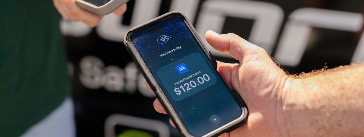 Customer paying $120 by phone for a mobile safety certificate inspection on the Gold Coast