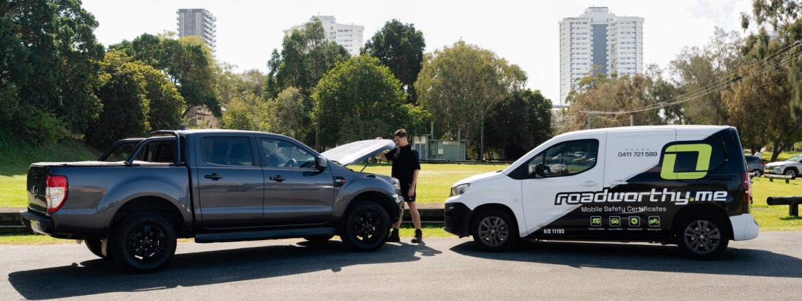 Ute with the bonnet up beside the Roadworthy.me van for a QLD safety certificate or COI inspection