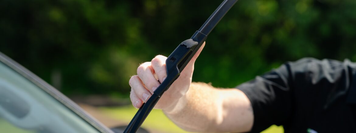 Close-up of a windscreen wiper blade being checked before a QLD safety certificate